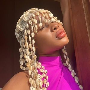 Lafalaise Dion cowries hat !